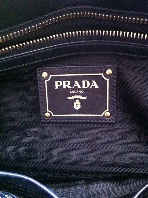 do prada bags have serial numbers inside|Prada serial number check.